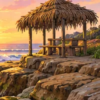 A small hut with a palm-leaf roof on sandstone rocks at sunset.